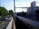 des trains  ter+ des trains TGV  qui s 'arréte au feu rouge et il redémarre au feu orange+train TGV à Lyon le 27/06/10