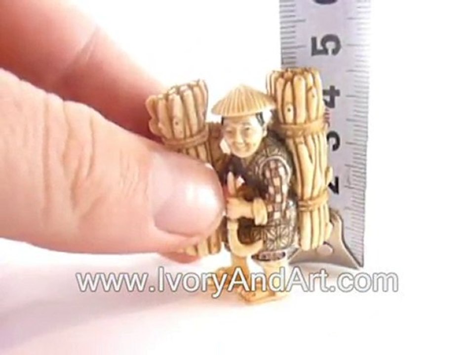 Mammoth Ivory netsuke - Old Japaneise Carrying wood