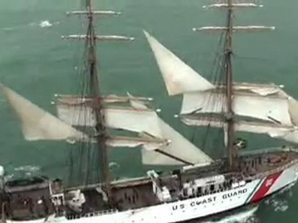 Coast Guard Cutter Eagle crew take in sails