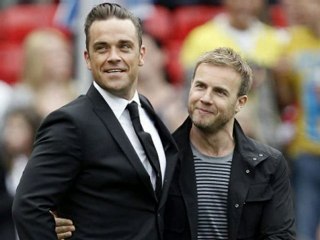 Robbie rejoins Take That