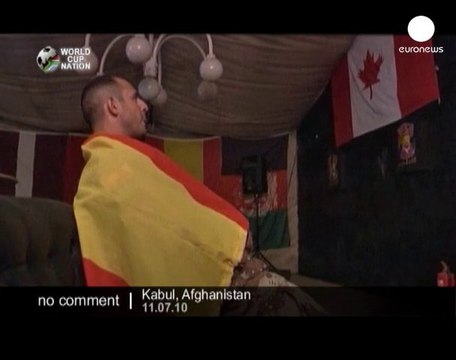 Dutch and Spanish troops watch World Cup... - no comment