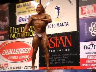 Didou RACHIDI posing Body Building Monde NABBA Malte