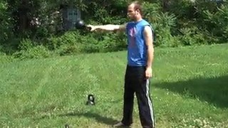 Kettlebell Swings: One Arm Swings Behind Leg