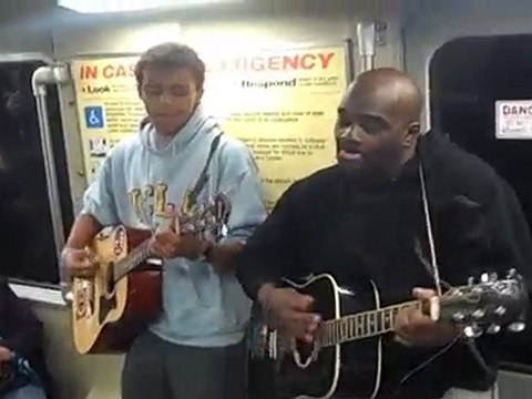 Musicians playing Beatles Norwegian Wood on BART train