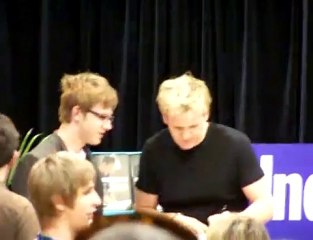 Gordon Ramsay signs books