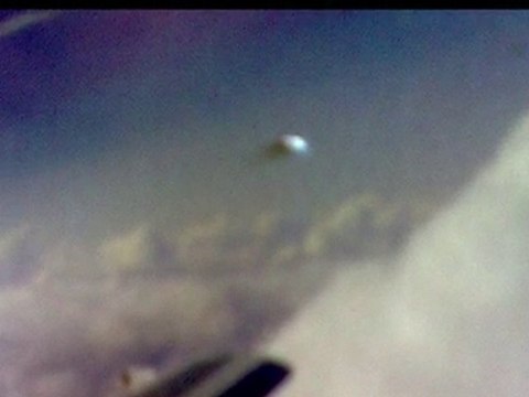 Remarkable UFO photographed from plane over Brazil - July 10