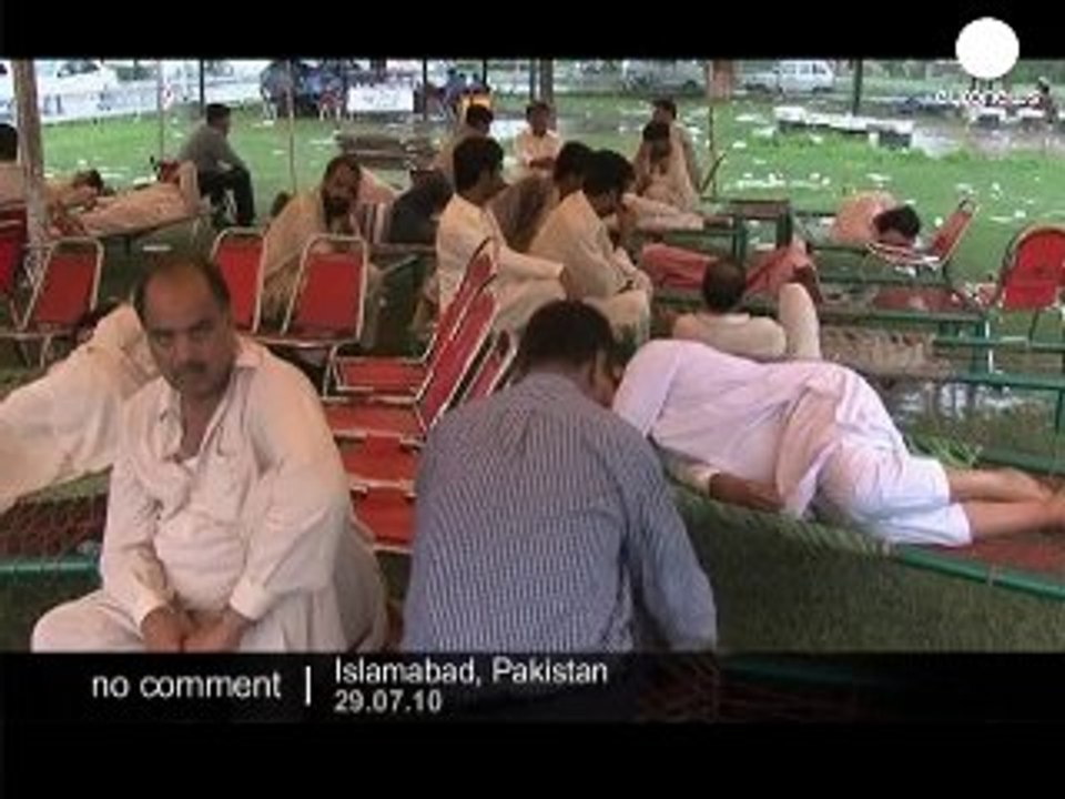 Relatives search for bodies at Pakistan air... - no comment