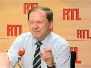 Le secrétaire d'Etat chargé du Commerce, de l'Artisanat, d