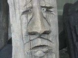 Terra Botanica : visage sculpté bois