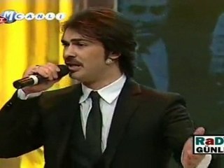 Oktay Ertuğrul £££ BİR MUMDUR