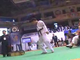 taekwondo compétition vétéran casse planche tuio tchagui