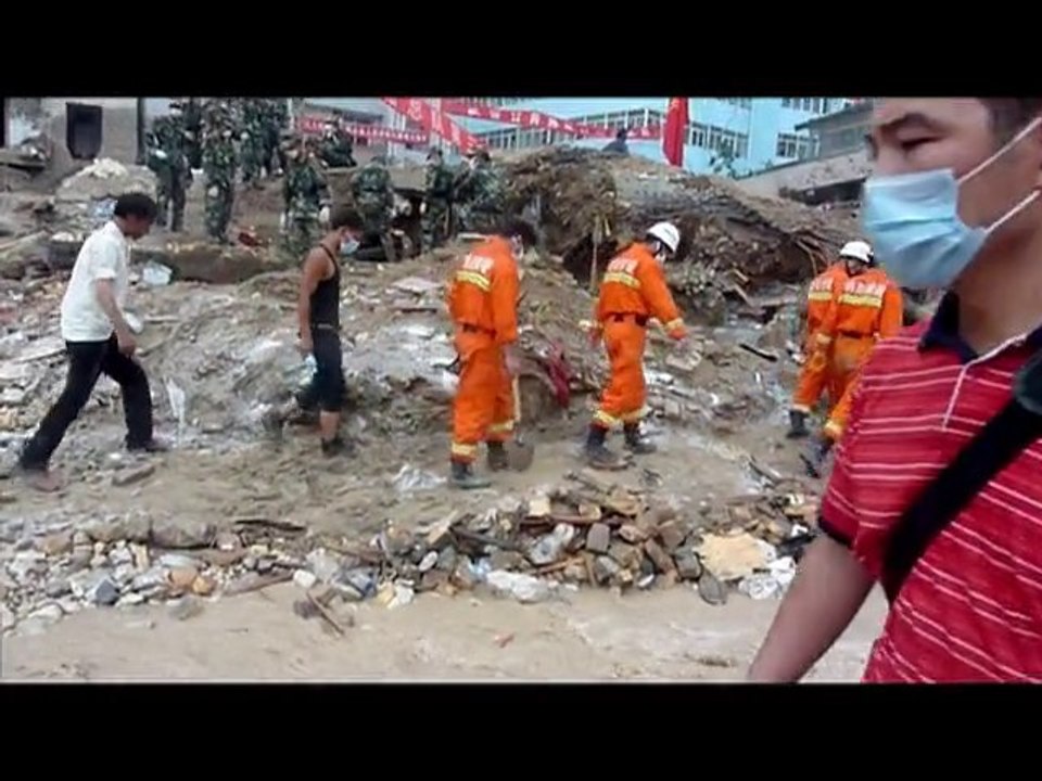 Rains bring new misery to China mudslide town