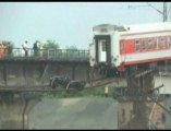 Floods Destroy Railway Bridge in Southwestern China