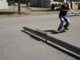 Ollie over a board and a handrail