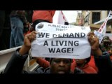 Striking South Africans hold mass protests over wages