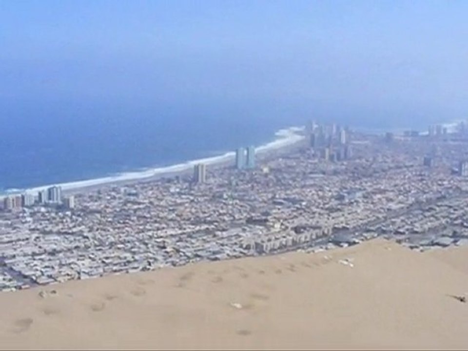 Descente d'une dune dune géante à Iquique