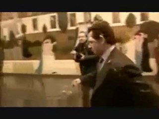 Nicolas Sarkozy, French president, being attacked by a pie