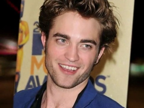 SNTV - RPattz Touches Down