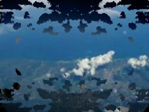 Daytime UFO recorded from plane over Tokyo - 5 June 2010