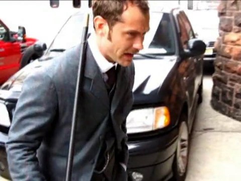 SNTV - Jude Law smiling despite drama