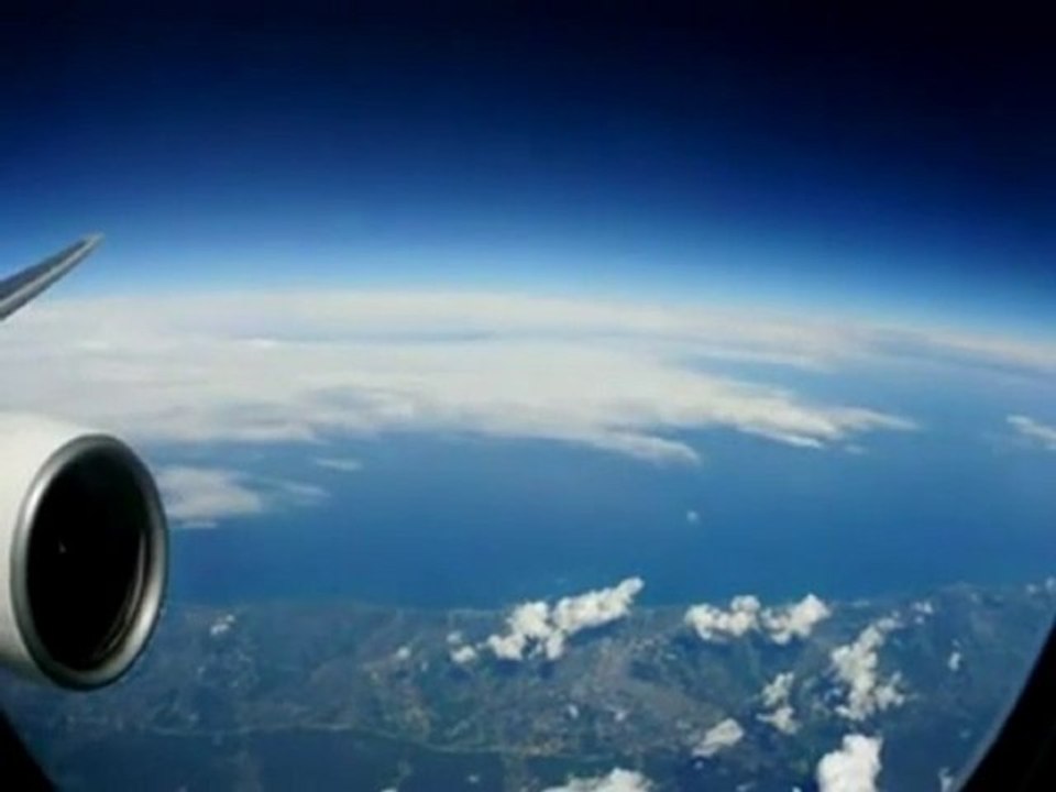 Daytime UFO Recorded From Plane Over Tokyo