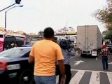 Truck full of dead bodies drags woman down street