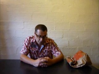 David Gouny eating a hamburger contaminated by a fat virus