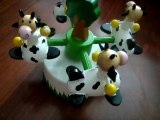 Boîte à musique avec un manège de 4 vaches