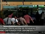 Chinos liberados por Japón llegan a su país