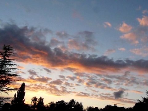 Couché d'soleil & nuages rapides