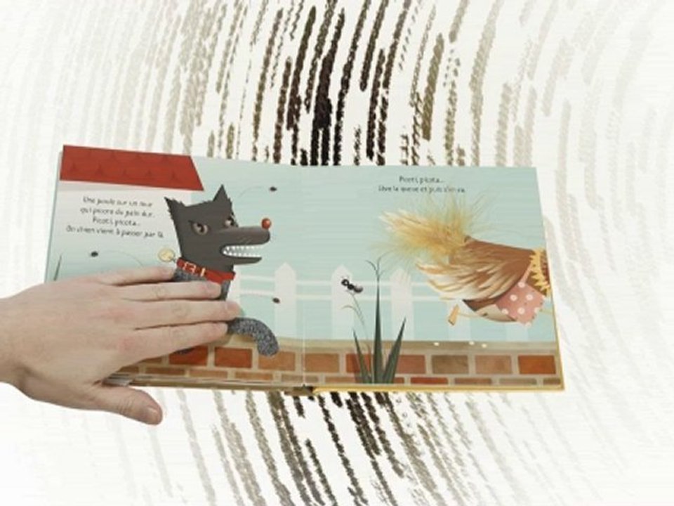 Petite poule sur un mur