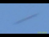 Cylindrical UFO photographed over Czech Republic 21-Apr-2009