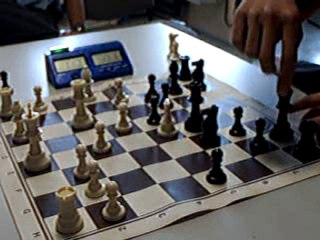 ECHECS : JULIEN 1 VS 0 STAN (CLASSE A 2010)