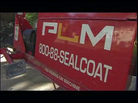 Parking lot sealcoating. Asphalt seal coating repair with ho