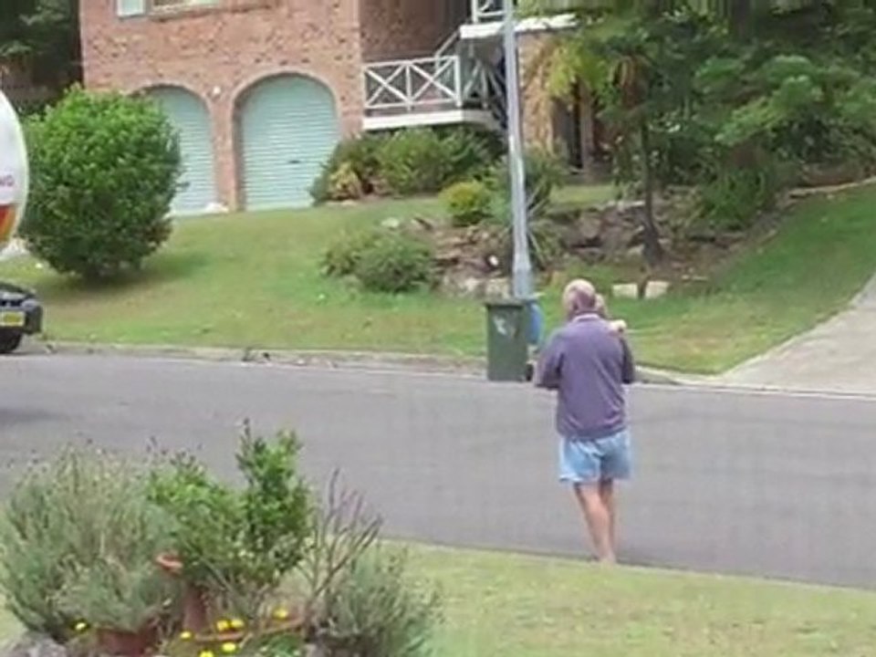 Grandpa and Kid watching Garbage Truck