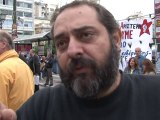 Thousands protest as Greek public workers face fresh pay cuts