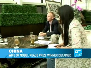 Wife of Nobel Peace Prize winner placed under house arrest