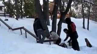 Double ramassage en snowboard