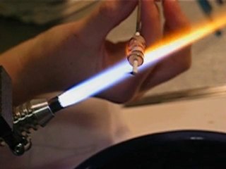 Démonstration arabesques sur perle cylindrique