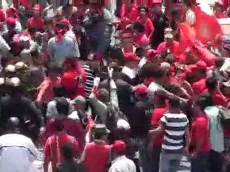 Red Shirts Push Back Police to Take Bangkok Streets