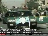 Católicos realizan funerales de sacerdotes muertos durante