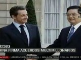 Francia y China firman acuerdos millonarios