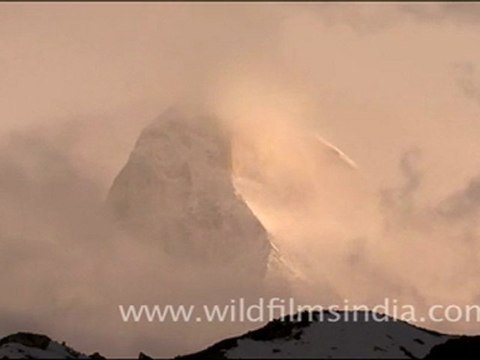 Shivling and swirling clouds at sunset!