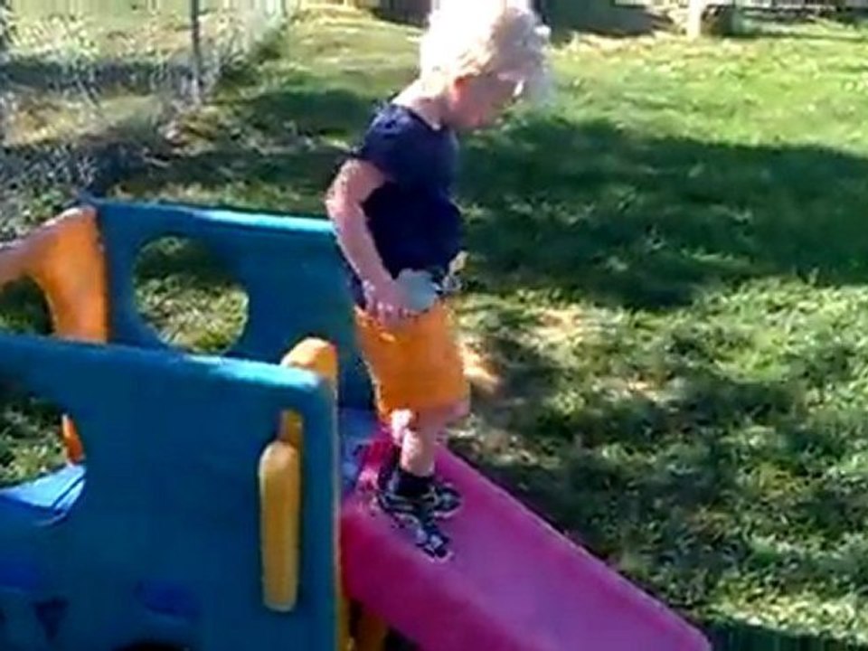 Mac Has Fun With Her New Slide.