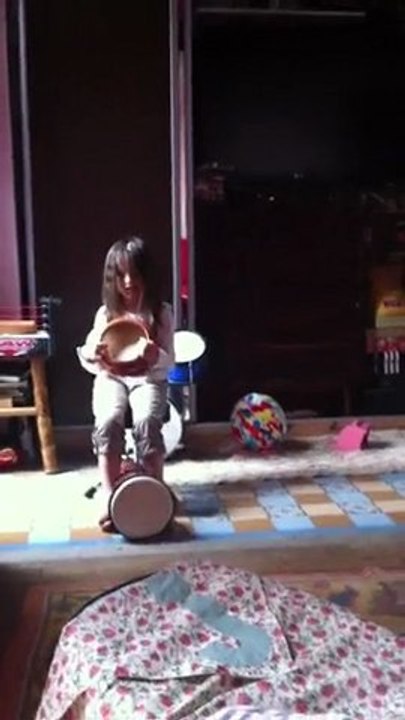 Ida playing kompang