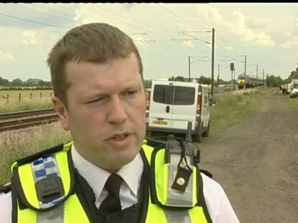 Man and child hit by train