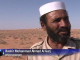 Arabic-web-Libyan rebels pick over seized Kadhafi arms depot