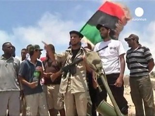 Rebel fighters retake village en route for Tripoli