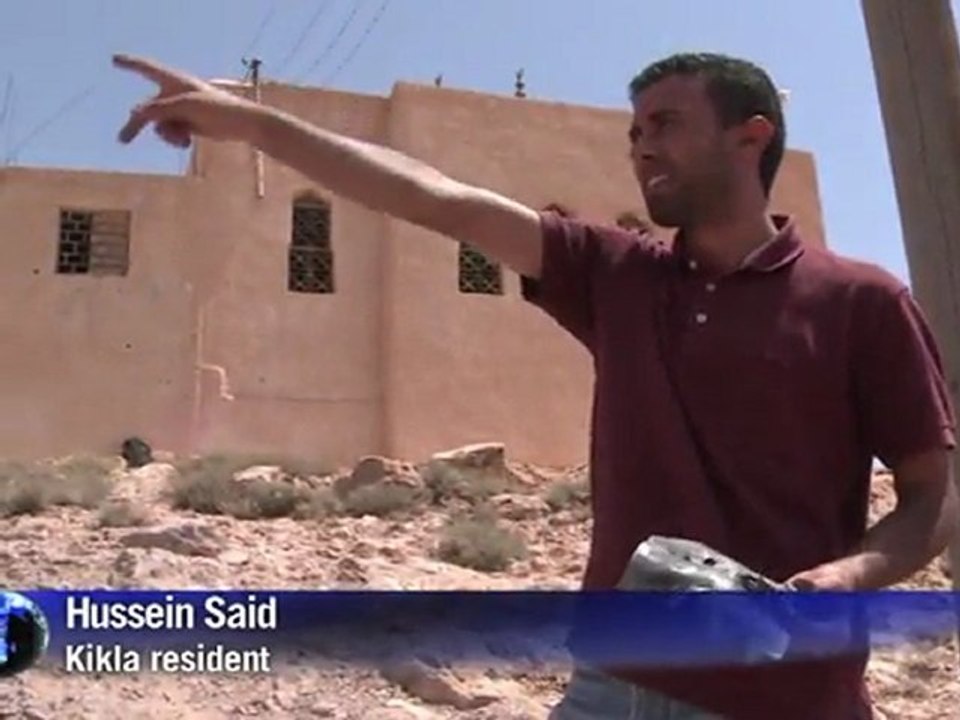 Arabic-Web-Libyan front line village braves daily onslaught