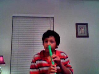 Gerry playing recorder with his nose